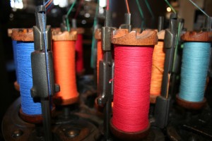 Dedicated to Dan Mayer, exhibit designer and historian, who not only encouraged explorations into the past and was a member of the Society of Industrial Archaeology - linked at the colorful spools image - but also is remembered as a good friend. Color spooled inside the mill. Stories of textiles and business.