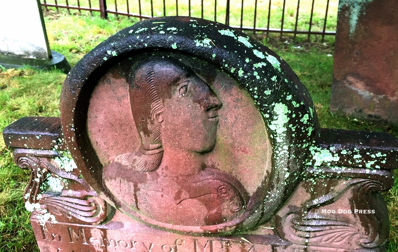 Imagine the carver of this old gravestone.