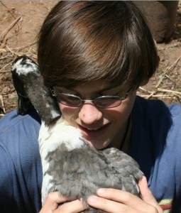 Josh and Holly, a pet duck he raised.