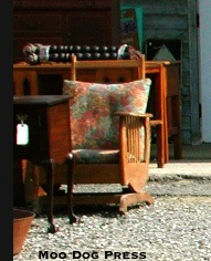 A perfect chair for reading waits at Brimfield.