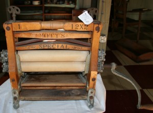 Mott's Special - an old wringer waits for its next owner. We'll tell you where. Moo Dog Press.