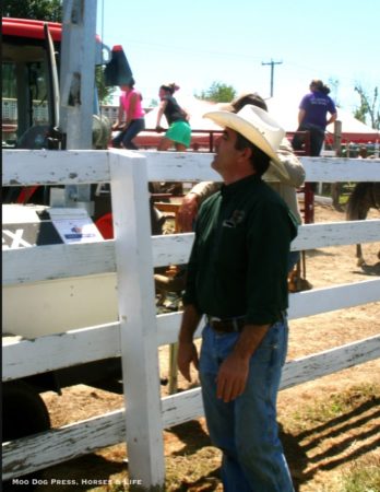 Hat, boots, jeans - working gear worn well as Peter Latronica of Lock, Stock  & Barrel, takes in the competition and barrel racing.