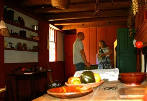 The kitchen and talk about old houses and wideboard floors.