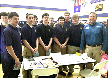 Jonathan Duncklee, president of Duncklee Cooling and Heating, with students at Norwich Technical High School on a visit earlier in 2016. He answered questions and provided valuable career information to all students interested in Heating, Ventilating, & Air Conditioning (HVAC). Students gave Duncklee a full tour of their campus.