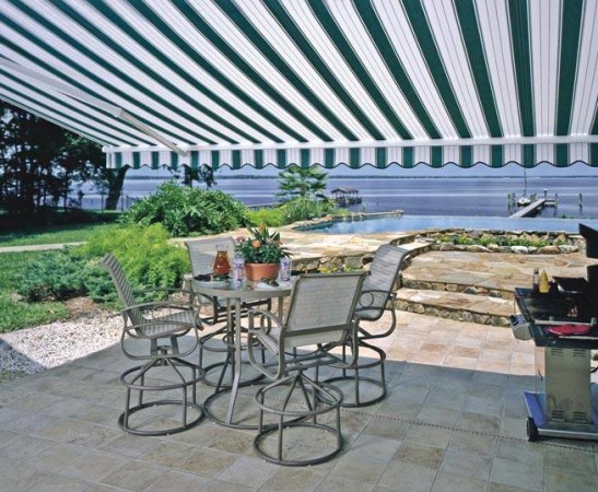 Sunesta retractable awnings, outdoor furniture, custom summer kitchens.