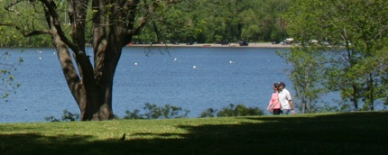 Walkers at Wethersfield Cove, near the new location of the farmers' market.